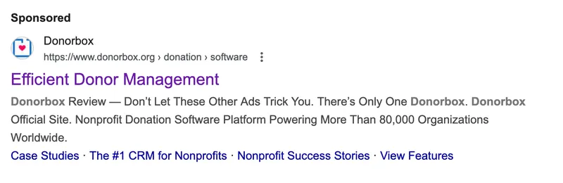 Sponsored Google ad for Donorbox titled "Efficient Donor Management," boasting about powering 80,000 nonprofits